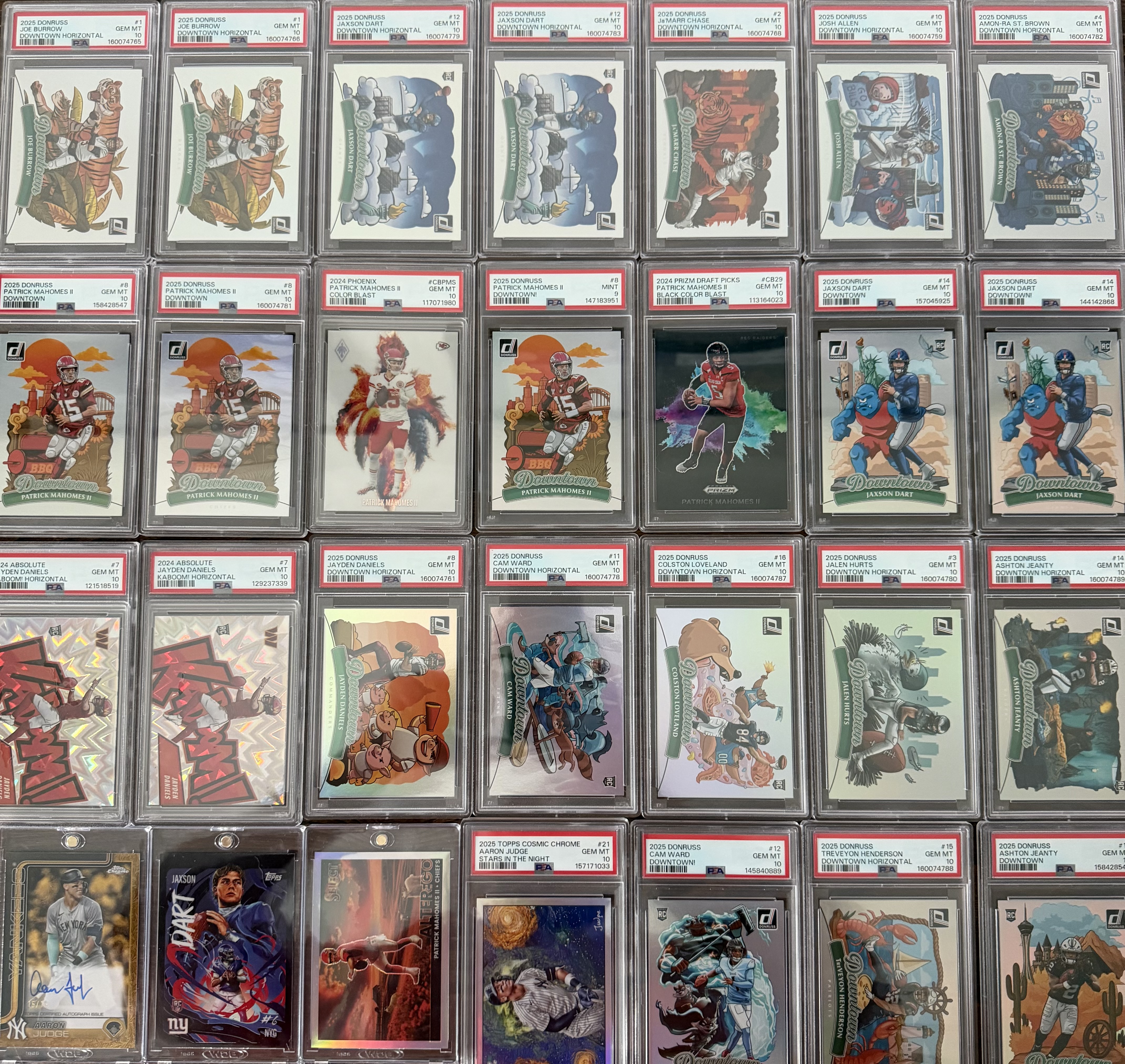Graded case-hit cards bought at the Austin Card Show, June 2026