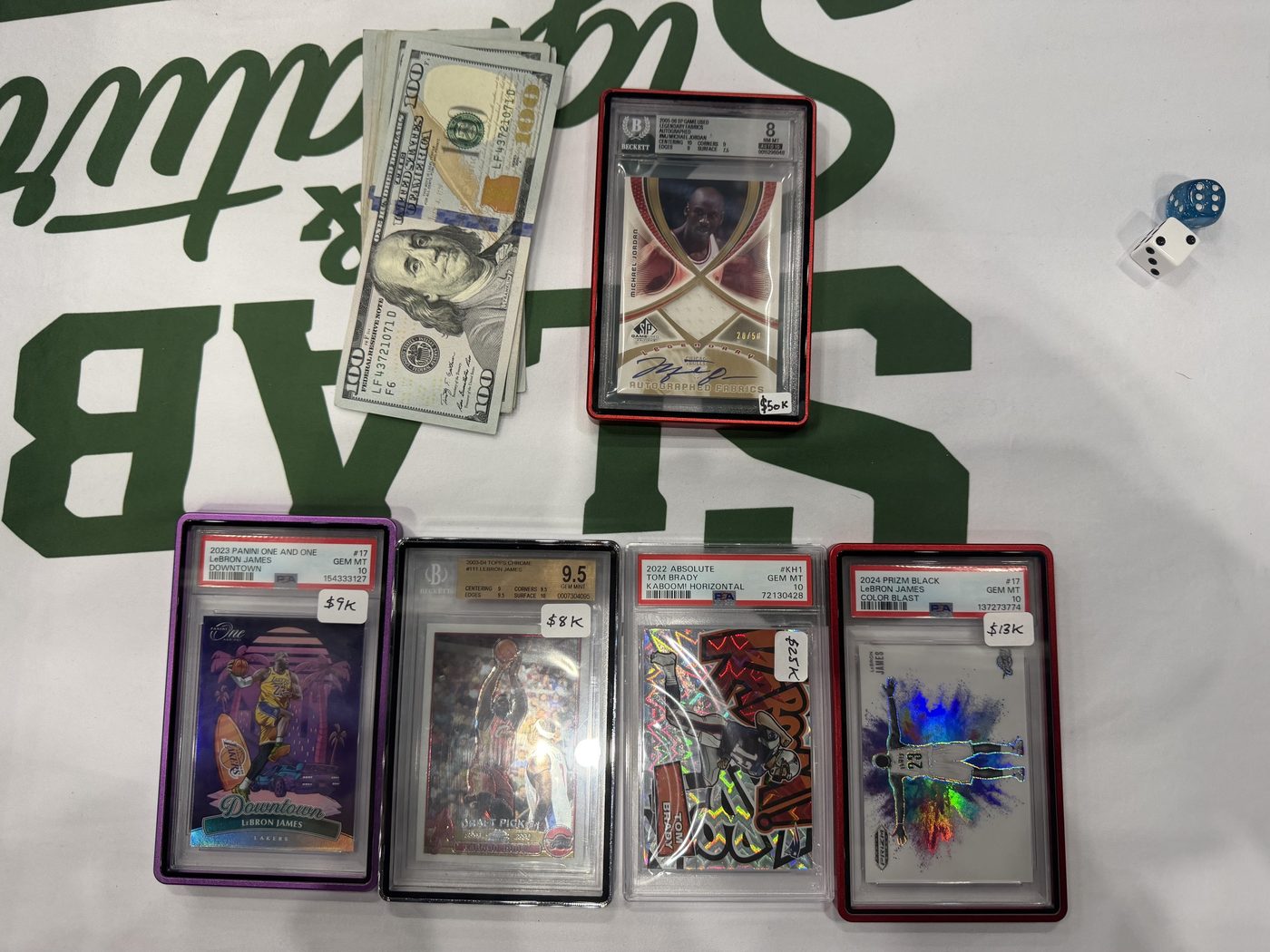 A Michael Jordan SP Game Used autograph patch and cash traded for four graded cards at the Dallas Card Show in Houston