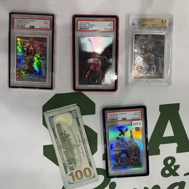 The 2020 Donruss Tom Brady Lighthouse Downtown PSA 10 and cash traded for a 2003 Topps Chrome LeBron refractor PSA 9, a 1993 Ultra Michael Jordan Scoring Kings PSA 9 and a LeBron Topps Chrome BGS 9.5 at the Dallas Card Show in Houston
