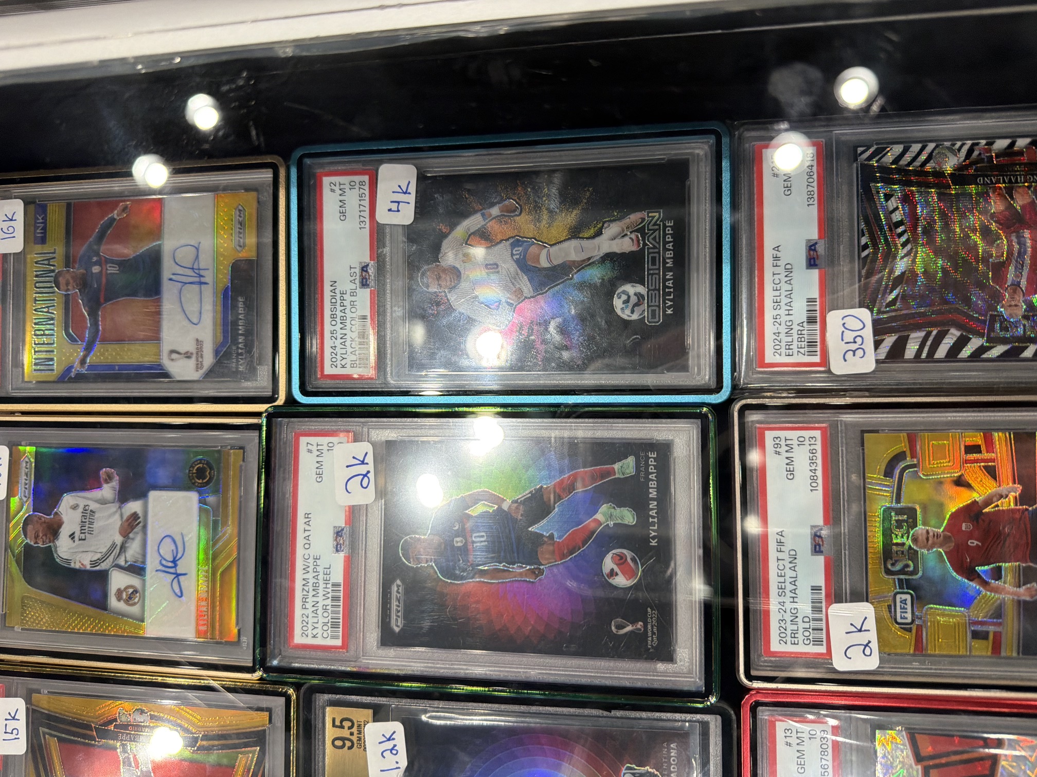 Graded soccer cards on display at the H-Town Card Show, June 2026