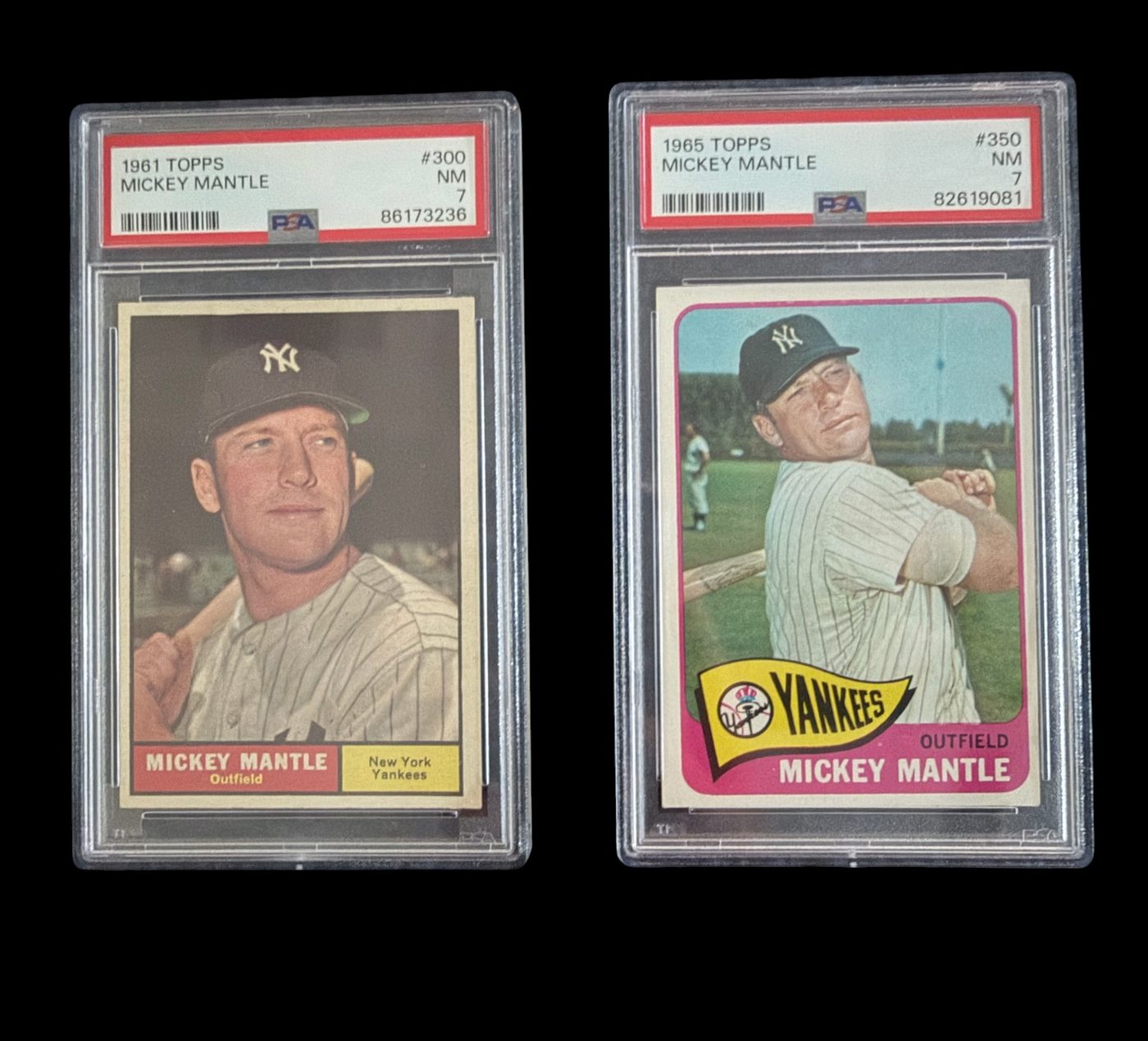 A 1961 Topps #300 and 1965 Topps #350 Mickey Mantle, both PSA 7, bought at the H-Town Card Show in August 2026