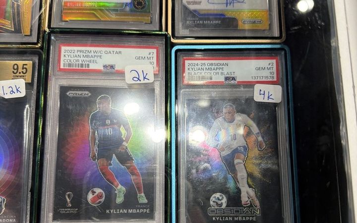 Graded soccer cards on display at the H-Town Card Show, June 2026